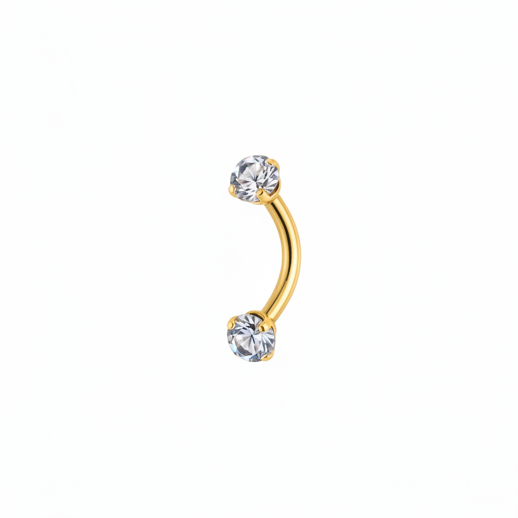 Piercing sopracciglio curvo oro con cristalli su sfondo bianco